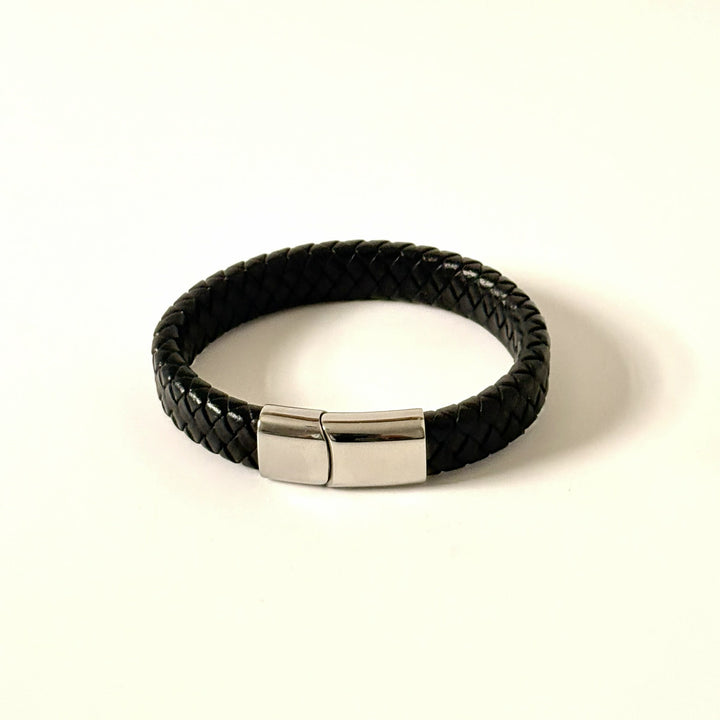Men’s black braided leather bracelet with polished stainless steel clasp front view