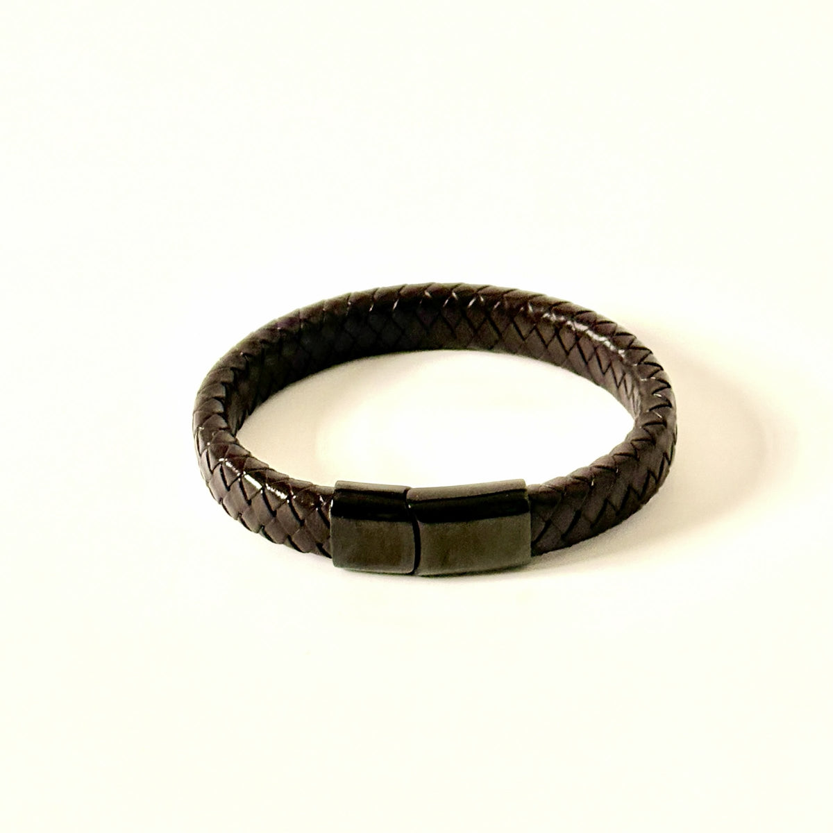 Men’s brown braided leather bracelet with gunmetal clasp front view
