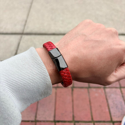 Men’s red braided leather bracelet worn on wrist