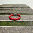 Men’s red braided leather bracelet with polished stainless steel clasp back view