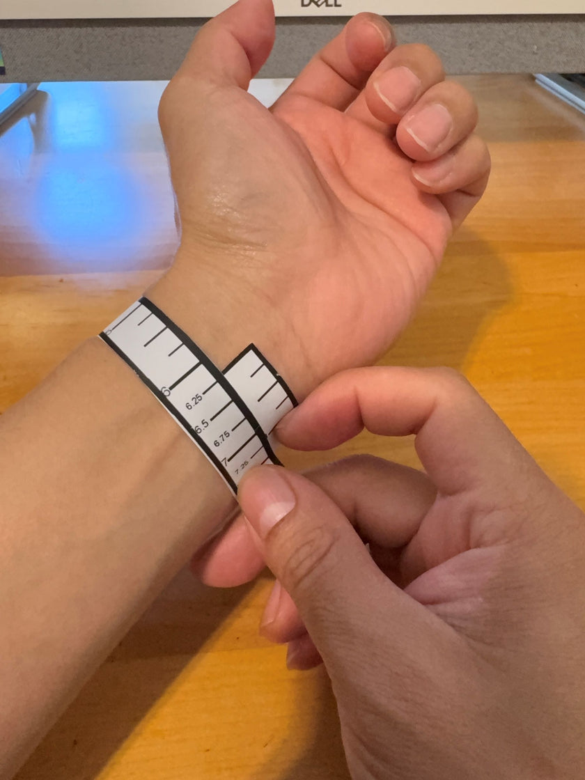 Wrist measurement using the Solid & Refined printable measuring strip